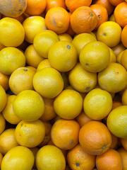 A heap of fresh organic oranges