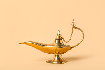Fototapeta na wymiar Aladdin lamp of wishes for Ramadan on beige background