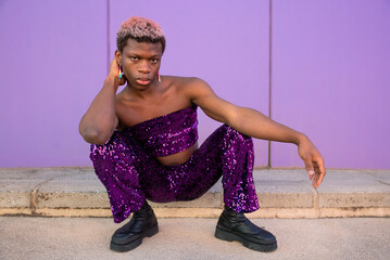 Transgender woman with sequined suit