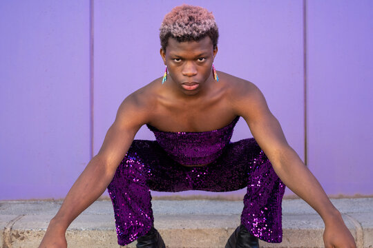 Non binary person with sequined suit