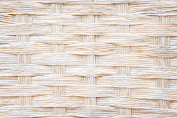 Weaving seamless texture of straw mat intelace patterns abstract light brown background