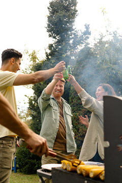 Friends Having Barbecue Party 