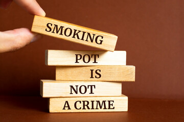 Wooden blocks with words 'Smoking Pot Is Not A Crime'.