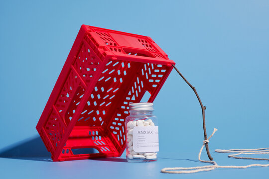 Box and stick trap with drugs