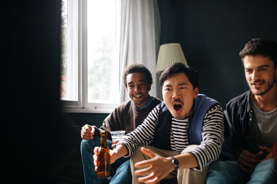 Friends Watching Game Match on TV