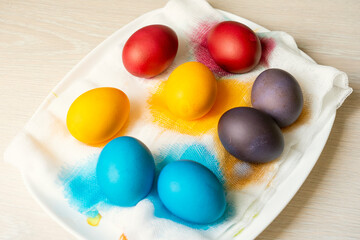 Painted eggs on the table after painting, a symbol of Easter, eggs 