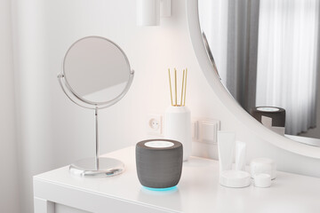 Generic non-brand smart speaker on dressing table. Smart home concept.