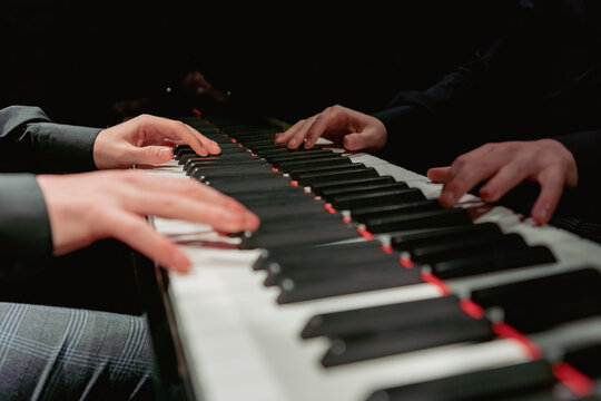 Hands close-up with a musical instrument