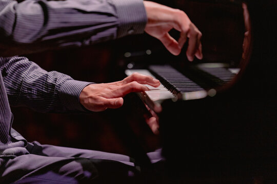 Hands close-up with a musical instrument