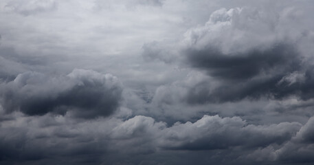 Obraz premium Clouds background, Rain clouds become dark gray like a big smoke before rainfall.