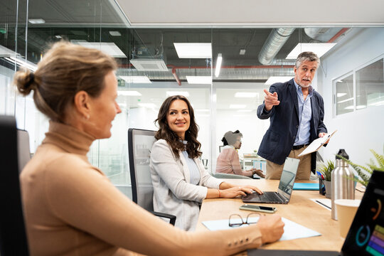 Businessman Talking in Office Meeting