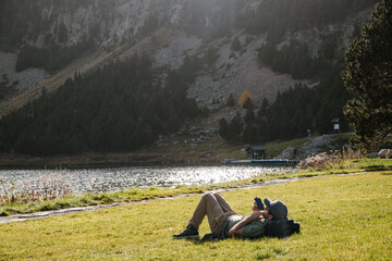 Relaxed man lying on the grass