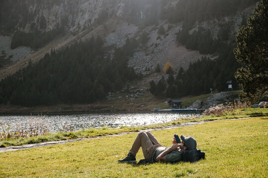 Relaxed man lying on the grass