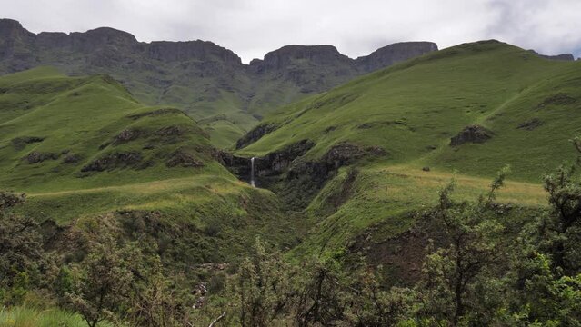 Verdant green highland plateau cliff waterfall in Lesotho Africa