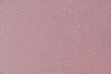 Pink abstract background, texture covered with raindrops by condensation.