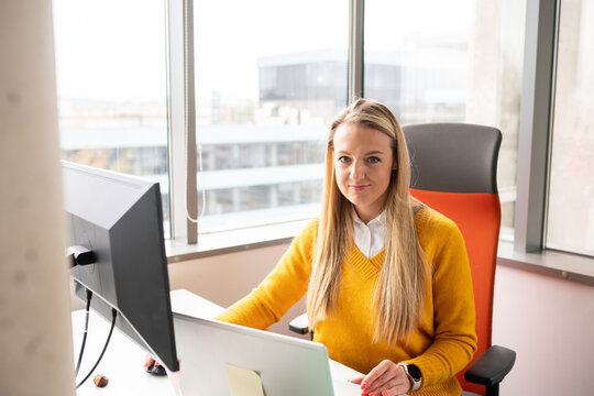 Woman At Office Desk