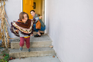 Mother and son coming home having fun