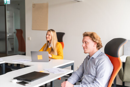 Workers At Business Meeting