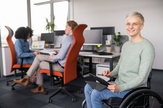 Portrait Of Woman With Disability At Office 