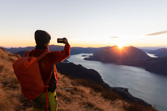 Hiker taking pictures of the landscape