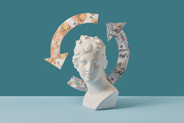 Antique statue with dollar and euro arrows.