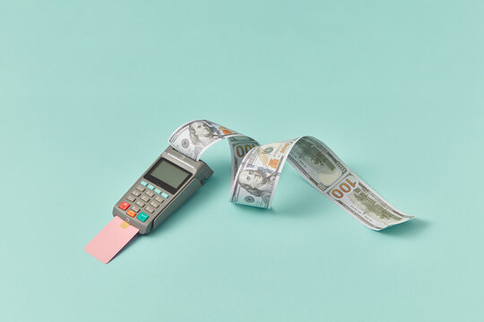 POS terminal with dollar receipt.