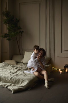 Young pregnant woman with son