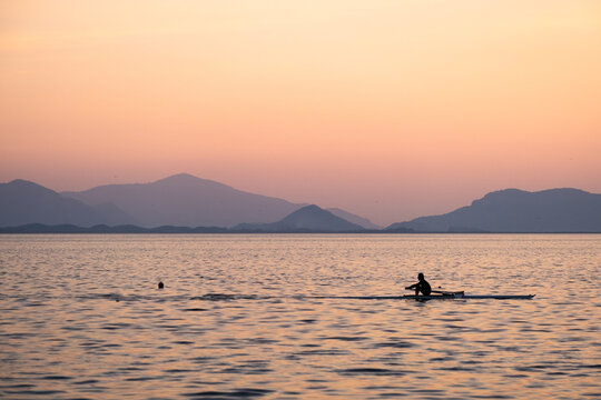rowing on a lake - Powered by Adobe