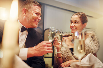 Success, love or happy couple toast in a party in celebration of goals or new year at luxury event. Motivation, congratulations or people cheers with champagne drinks or wine glasses at dinner gala