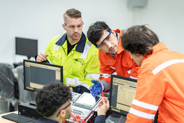 Electrical engineers supervise and design PLC electrical systems for companies or industrial...