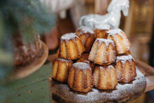 Sweet baked rum buns on counter.