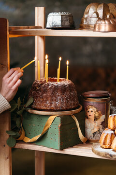 Female with festive cake.