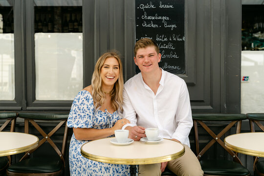 couple having coffee in Paris