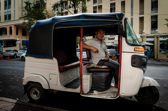 A tuk tuk driver takes a break in Phnom Penh, Cambodia