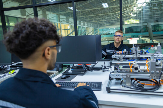 Robot engineers invent robots of the future that can replace humans.