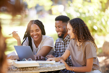 Students, friends and group studying with laptop at park outdoors. Education scholarship, learning teamwork and happy people, black man and women with computer for research at university or college.