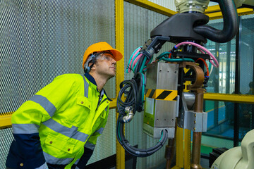 Fototapeta premium Robot engineers invent robots of the future that can replace humans.