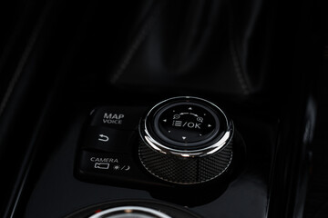 Car media controller close up. Modern car media and navigation control buttons