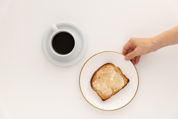 Food: Breakfast with toasts, butter and coffee