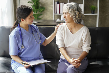 consulting female patient about pills and discussing health treatment sitting in the office at the desk. Medicine and health care concept. Doctor prescribing medicine to patient in the office.
