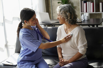 Fototapeta premium consulting female patient about pills and discussing health treatment sitting in the office at the desk. Medicine and health care concept. Doctor prescribing medicine to patient in the office.