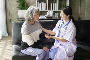  consulting female patient about pills and discussing health treatment sitting in the office at the desk. Medicine and health care concept. Doctor prescribing medicine to patient in the office.