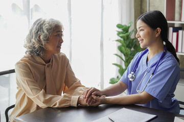  consulting female patient about pills and discussing health treatment sitting in the office at the desk. Medicine and health care concept. Doctor prescribing medicine to patient in the office.