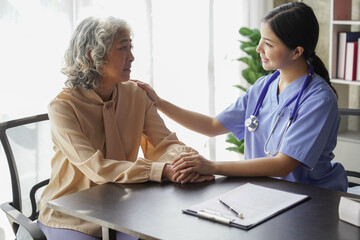  consulting female patient about pills and discussing health treatment sitting in the office at the desk. Medicine and health care concept. Doctor prescribing medicine to patient in the office.