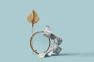 Extended dollar in metal rings display.