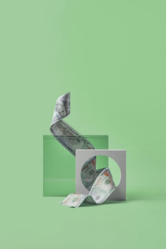 Extended dollar inside stone and glass podium.