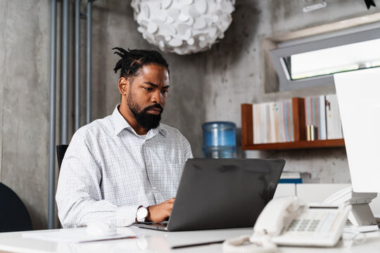 Man Having Difficulties At His Job In The Office