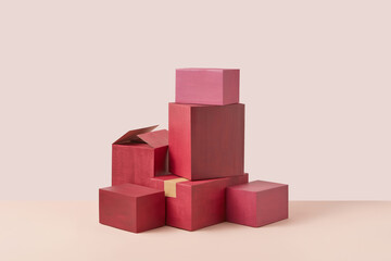 Pile of red cardboard boxes.