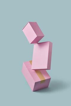 Pink parcel boxes hanging on blue background.