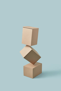 Cardboard boxes hanging over each other.